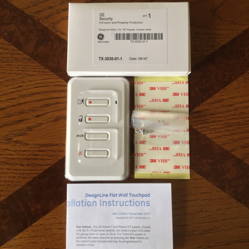 Brand New GE TX-3030-01-1 DesignLine 4-Button Flat Wall Wireless Touchpad, Simon