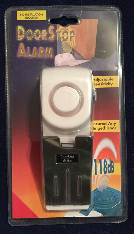 BRAND NEW Door Stop Alarm. Secures Any Hinged Door! Scares Away Intruders!!