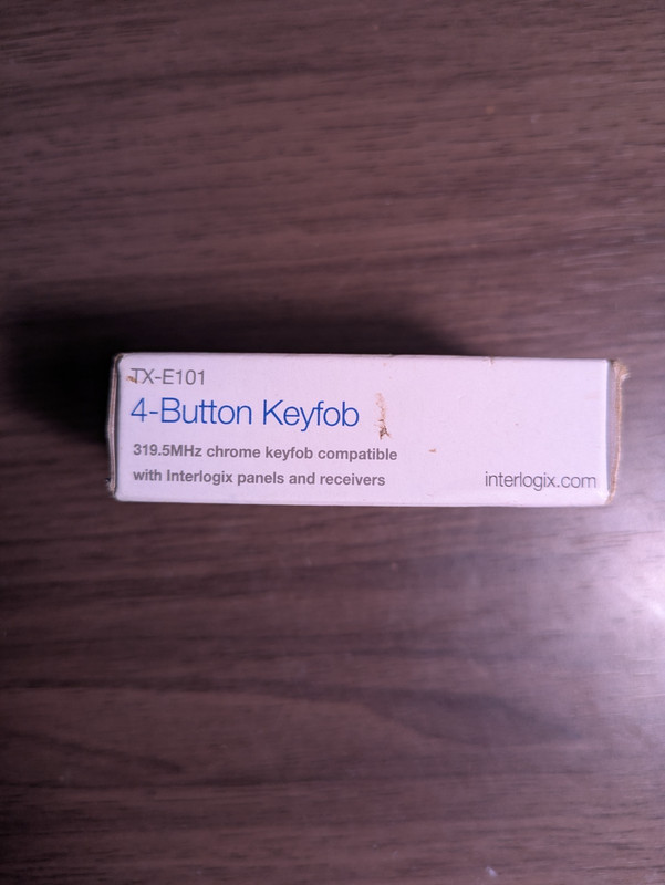 New - TX-E101 Interlogix 4-Button Keyfob for 319.5 Mhz gallery